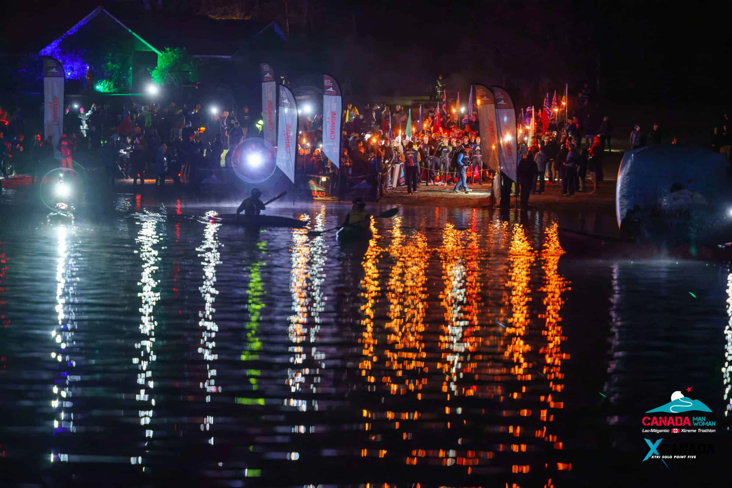Départ nocturne du Triathlon Extrême Canada Man XTRI World Tour à Lac-Mégantic